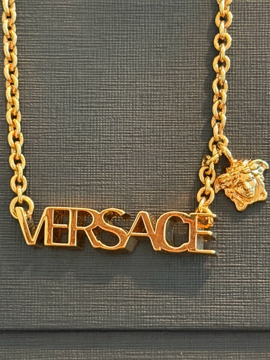 Versace Jewelry - ❤️❤️SOLD❤️❤️Versace Gold-tone Logo Skript and Medusa Charm Necklace
